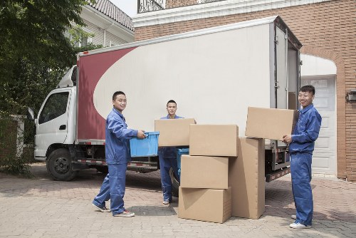 Professional packers organising boxes for a home move in Mitcham