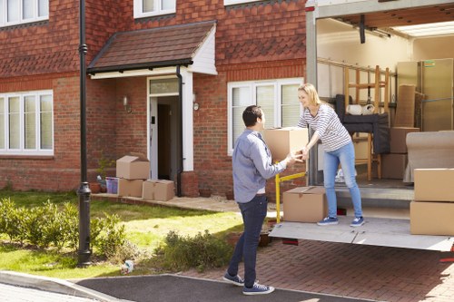 Packing and loading furniture into a removal van