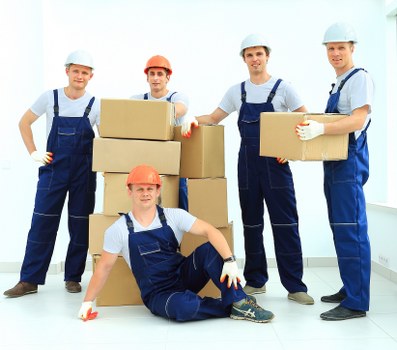 Packed boxes and furniture ready for local removals