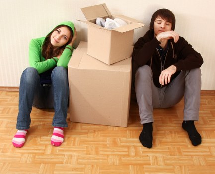 Loading furniture and boxes into a moving van