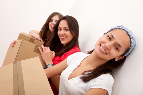 Team handling flat removals in a Mitcham apartment building