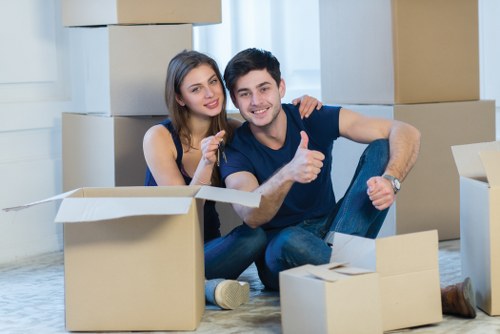 Unpacking boxes into a new room after a local move in Mitcham